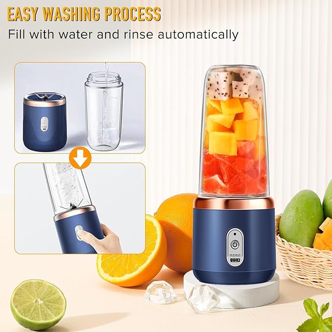 Blue portable blender with fruits and a basket of fruits on a light background