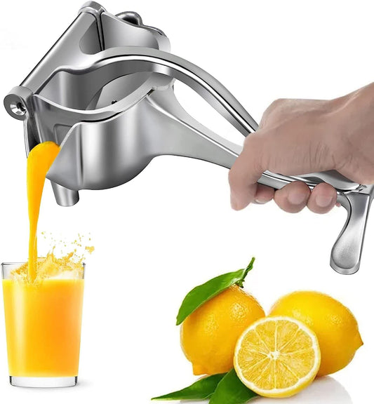 Hand using a manual lemon squeezer to extract juice into a glass with lemons on a white background